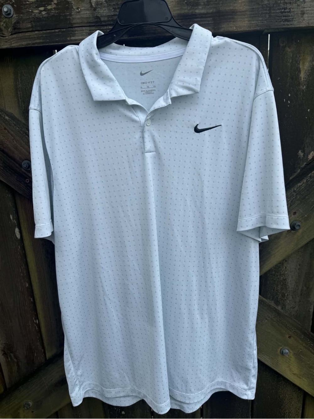 Nike White Polo with Black Swoosh